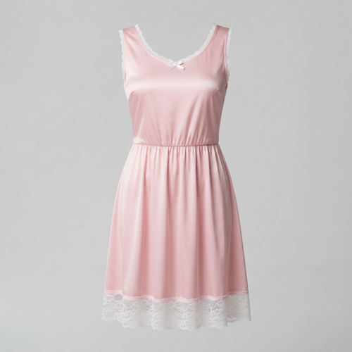 A sleeveless pink slip dress with delicate white lace trim at the neckline and hem, and a small bow at the center chest, shown against a neutral gray background.