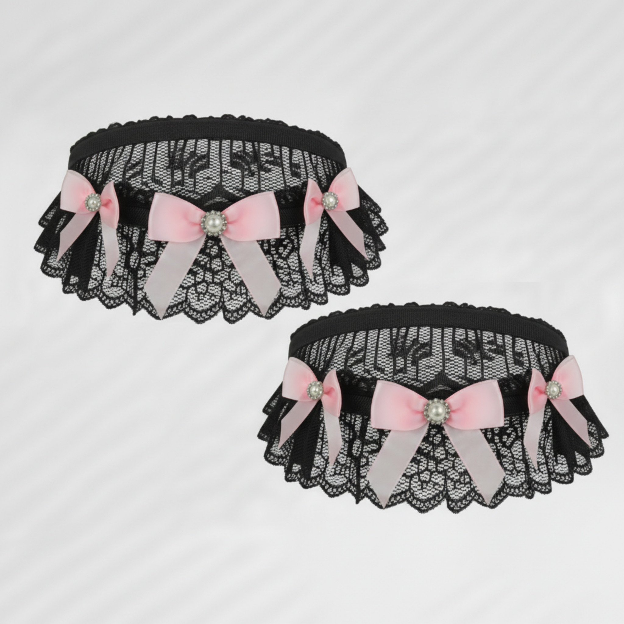 Black lace choker & garter with pink sheer bows and decorative elements on a light gray background