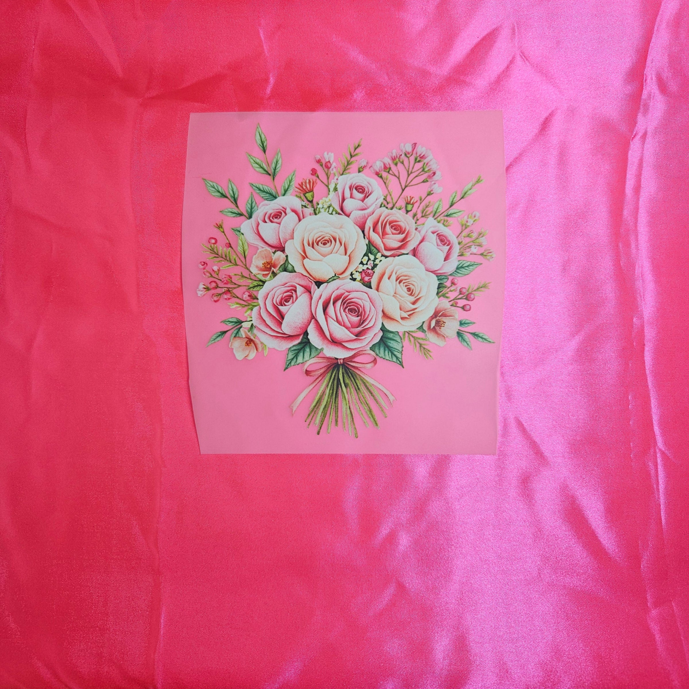 Floral embroidery design applique on pink neon satin fabric