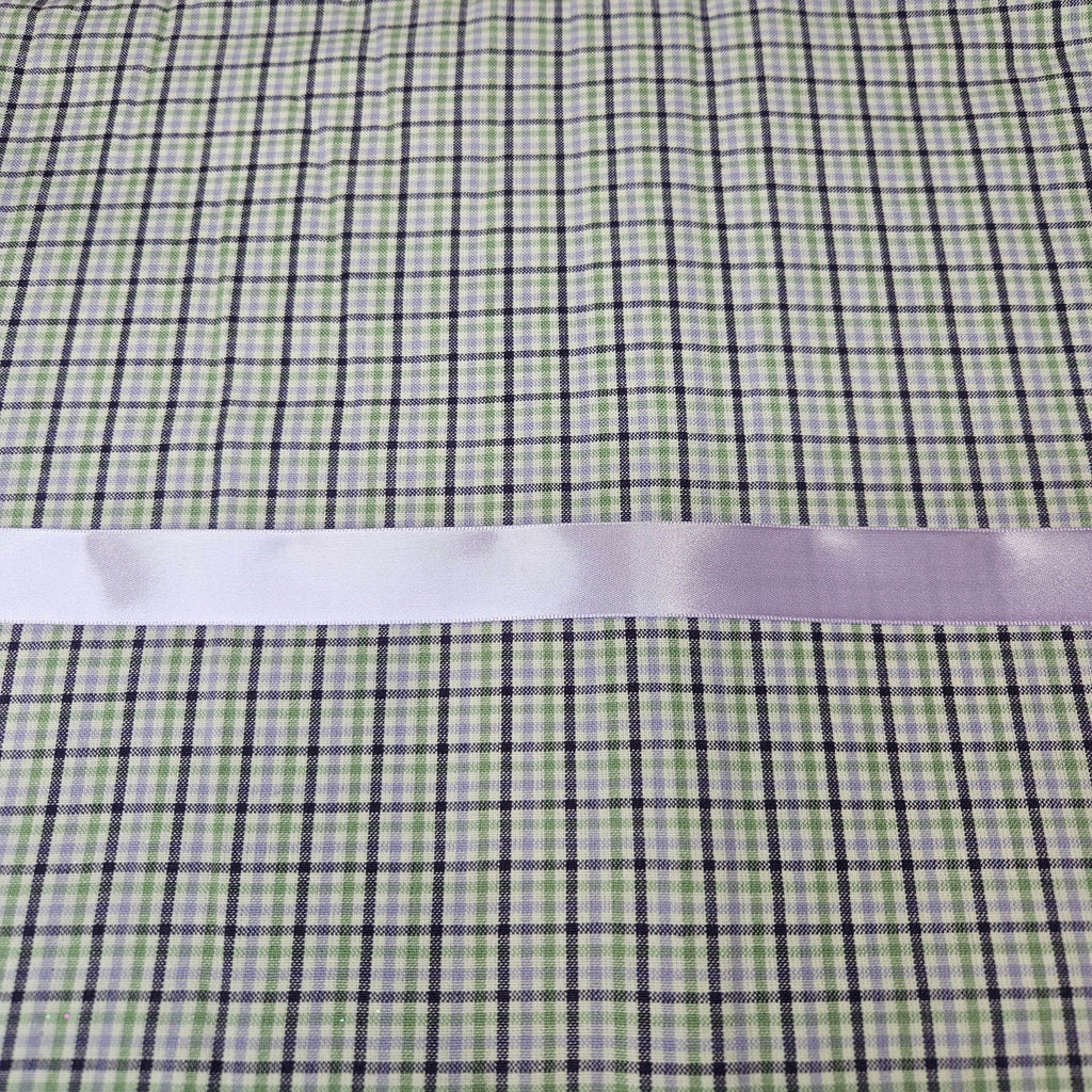 Green and purple checkered fabric with a lavender ribbon on top