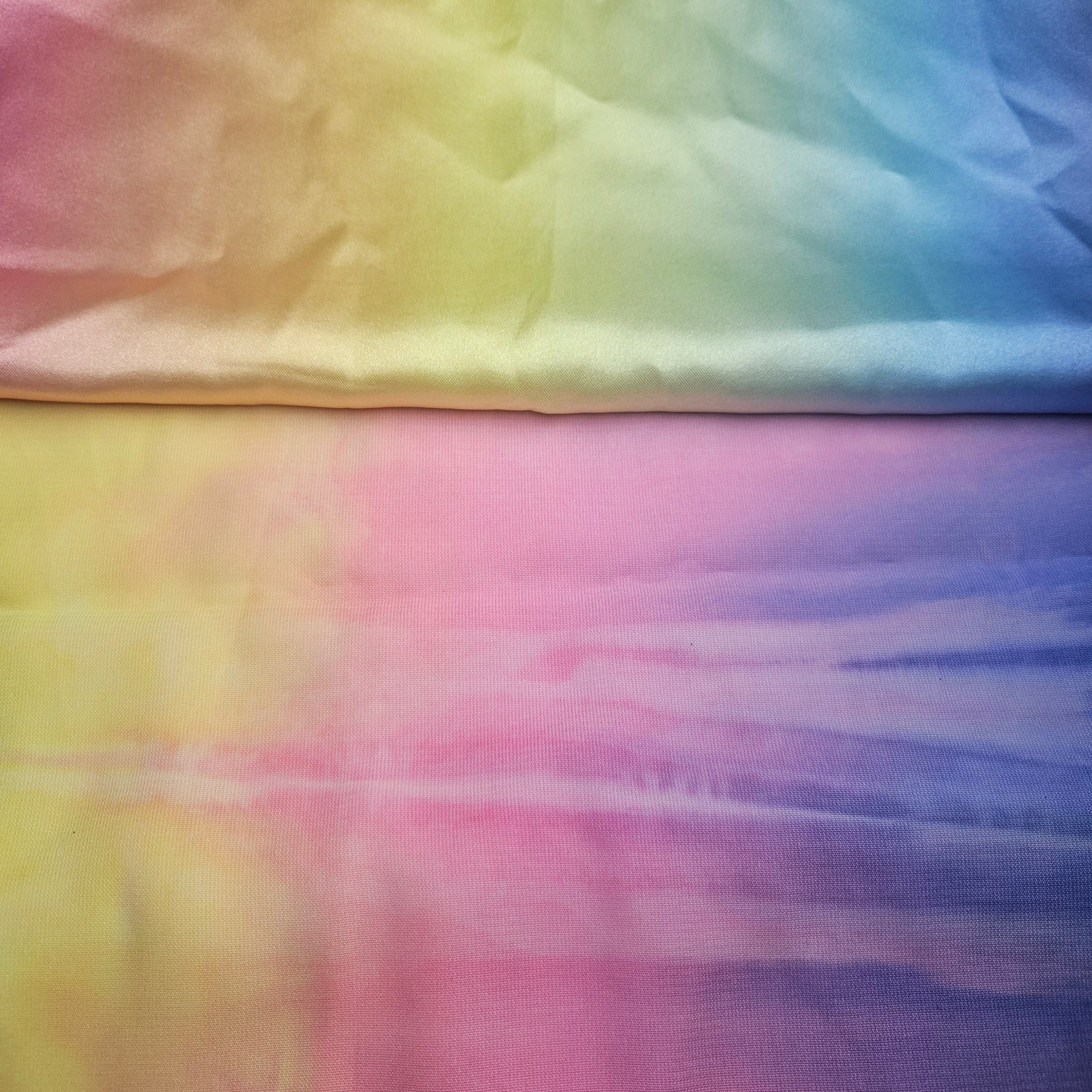Gradient fabric with pastel colors on a flat surface