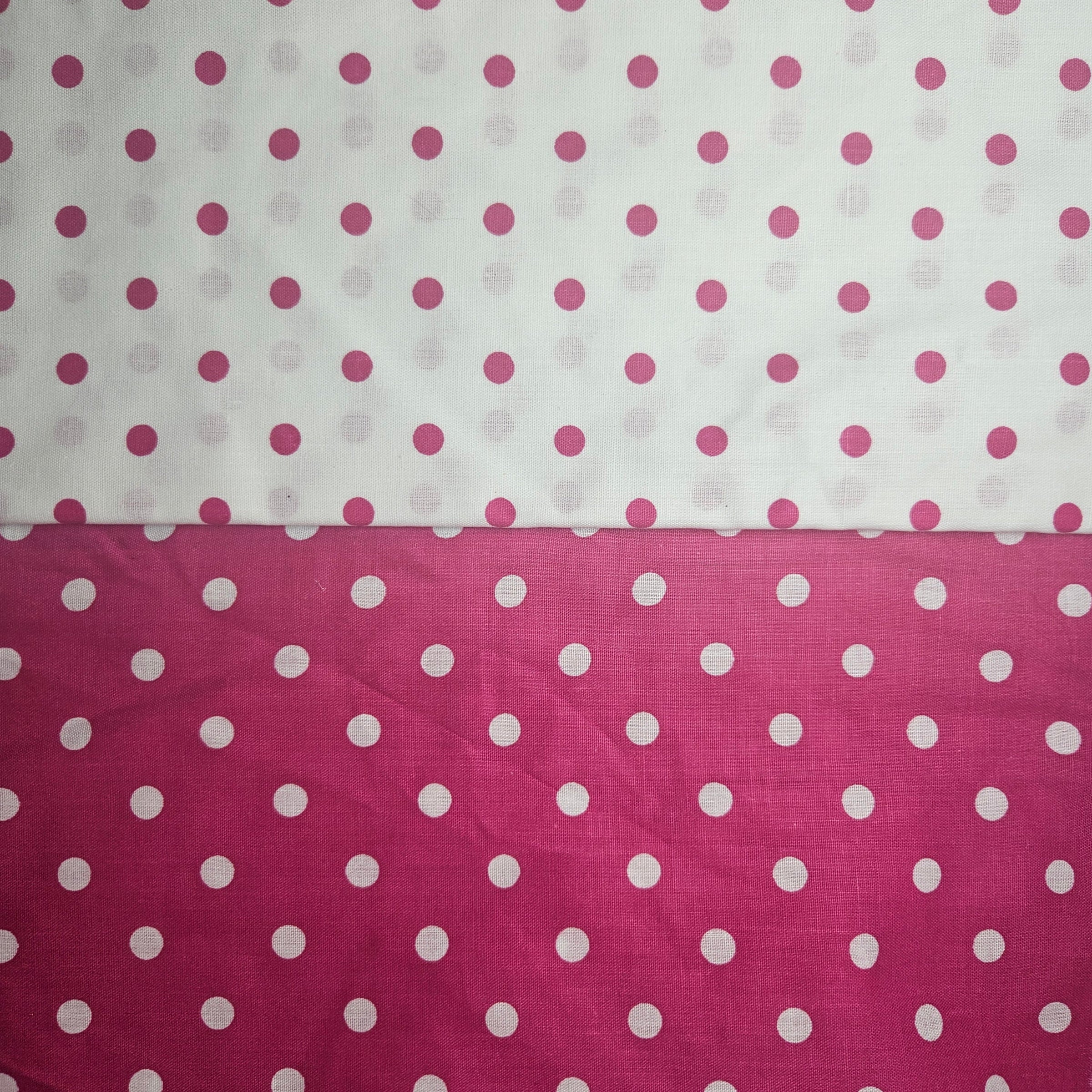 Two cotton fabric swatches with hot pink & white polka dot patterns
