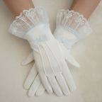 White gloves with lace cuffs on a neutral background