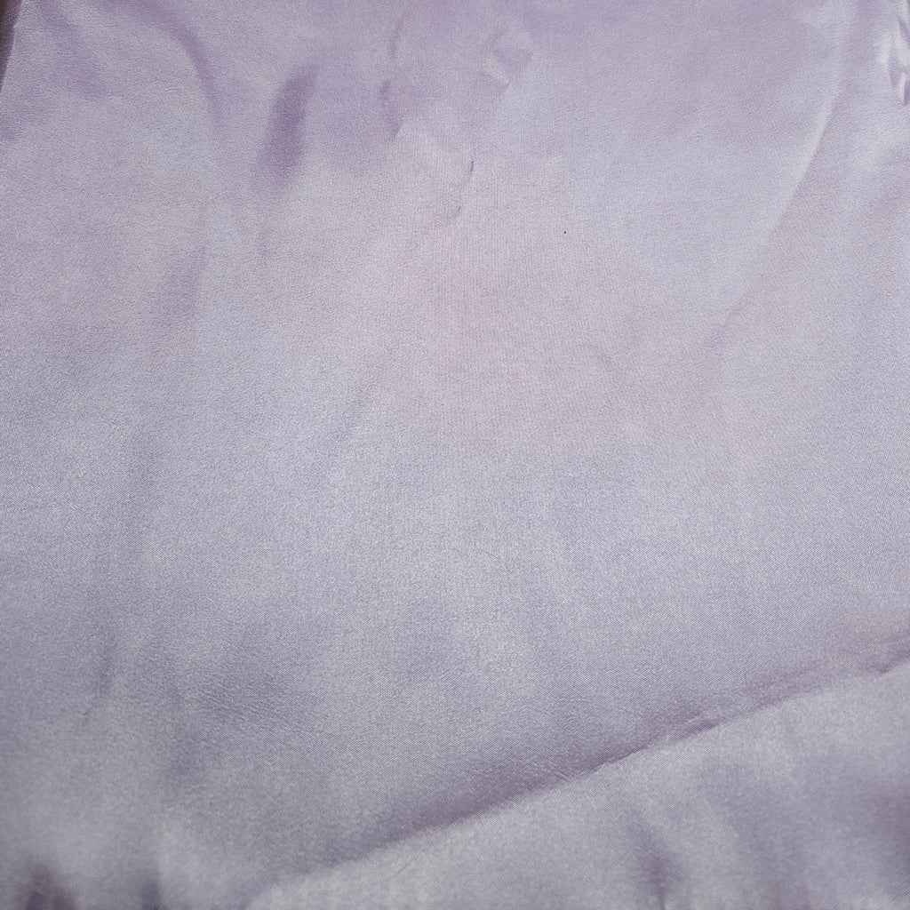 Close-up of lavender taffeta fabric with visible texture