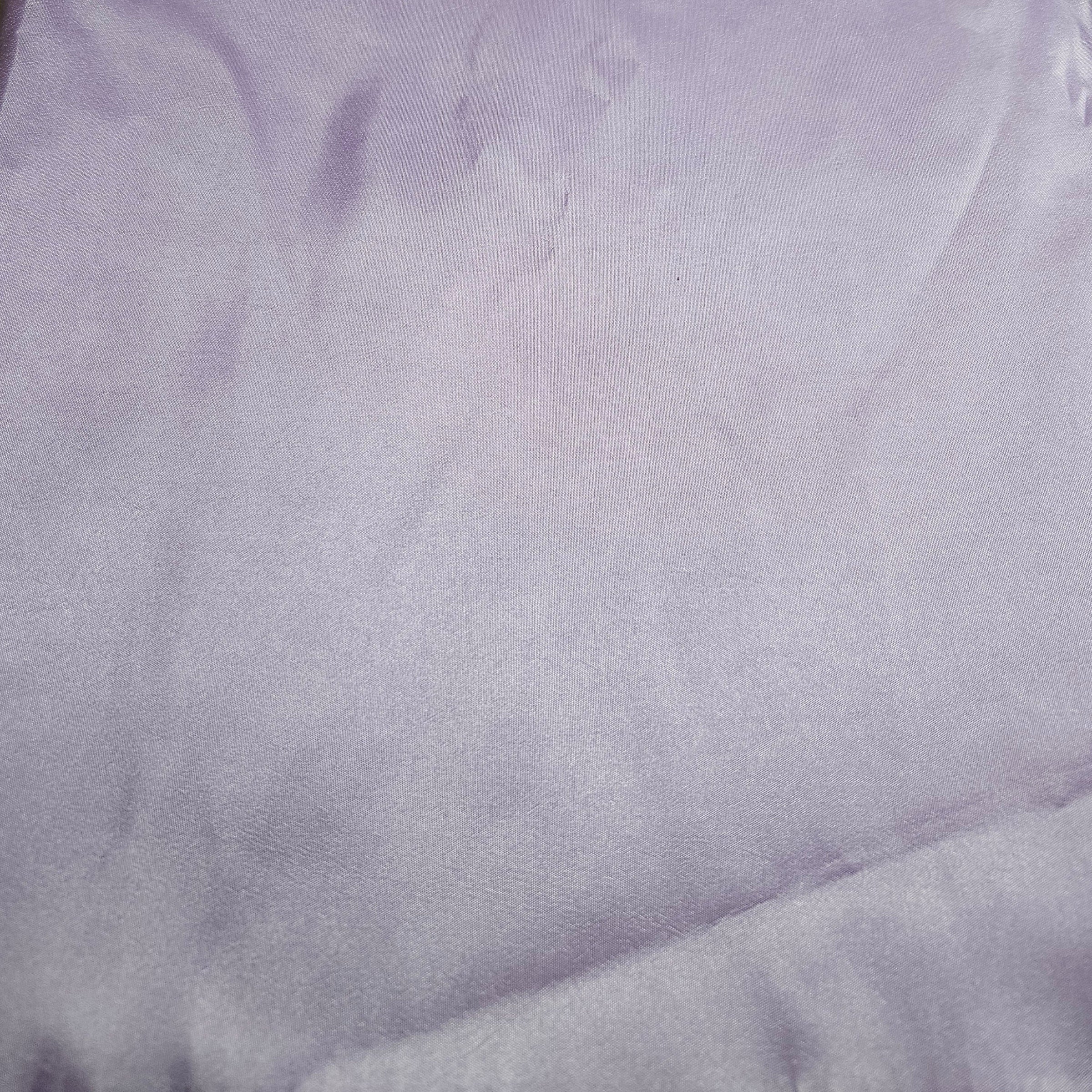 Close-up of lavender taffeta fabric with visible texture