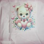 Cartoon bear applique with a bow and flowers on a pink taffeta background
