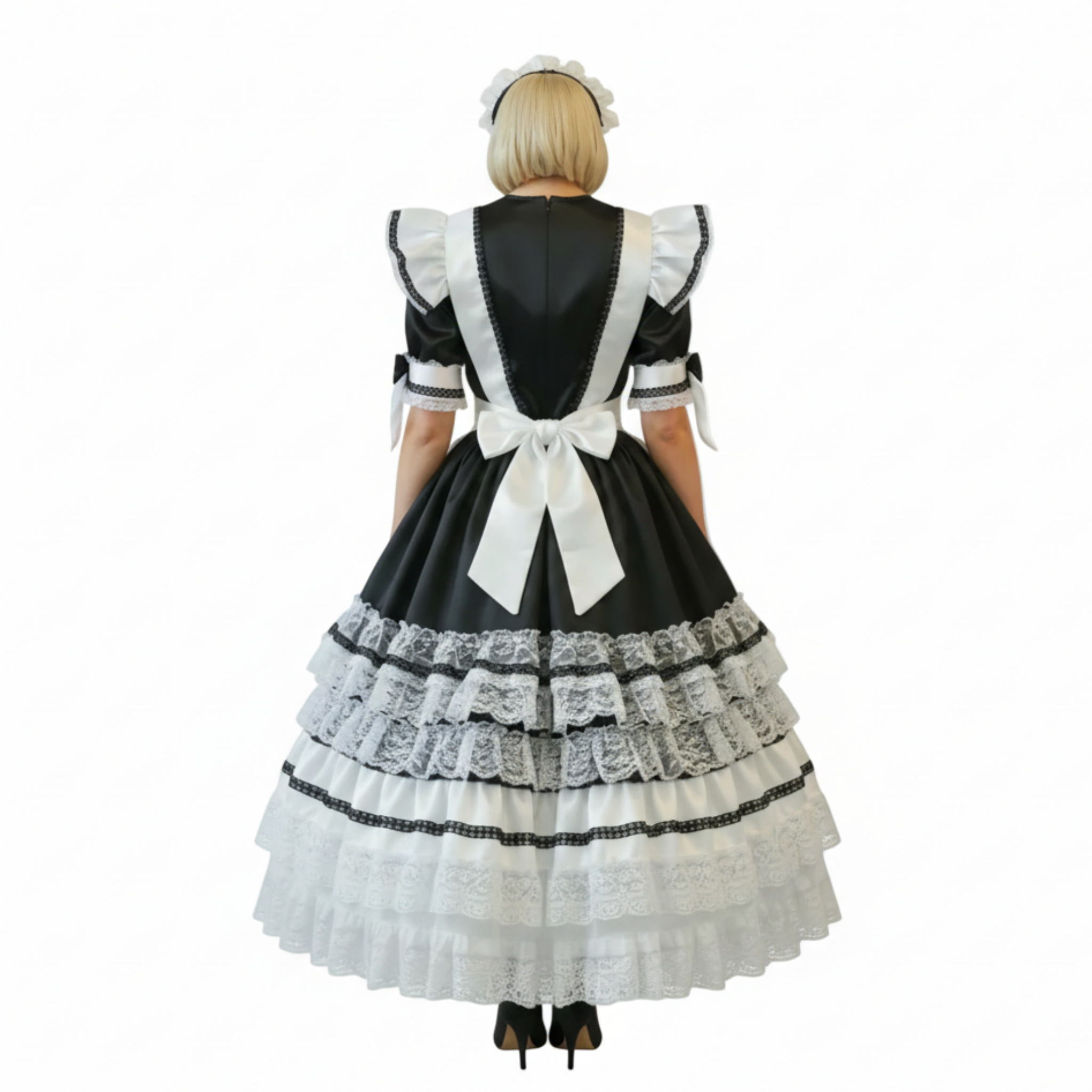 Black and white maid outfit with apron on a white background