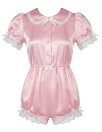 Pink satin romper with lace collar on a white background