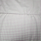 Close-up of a pink and white checkered fabric