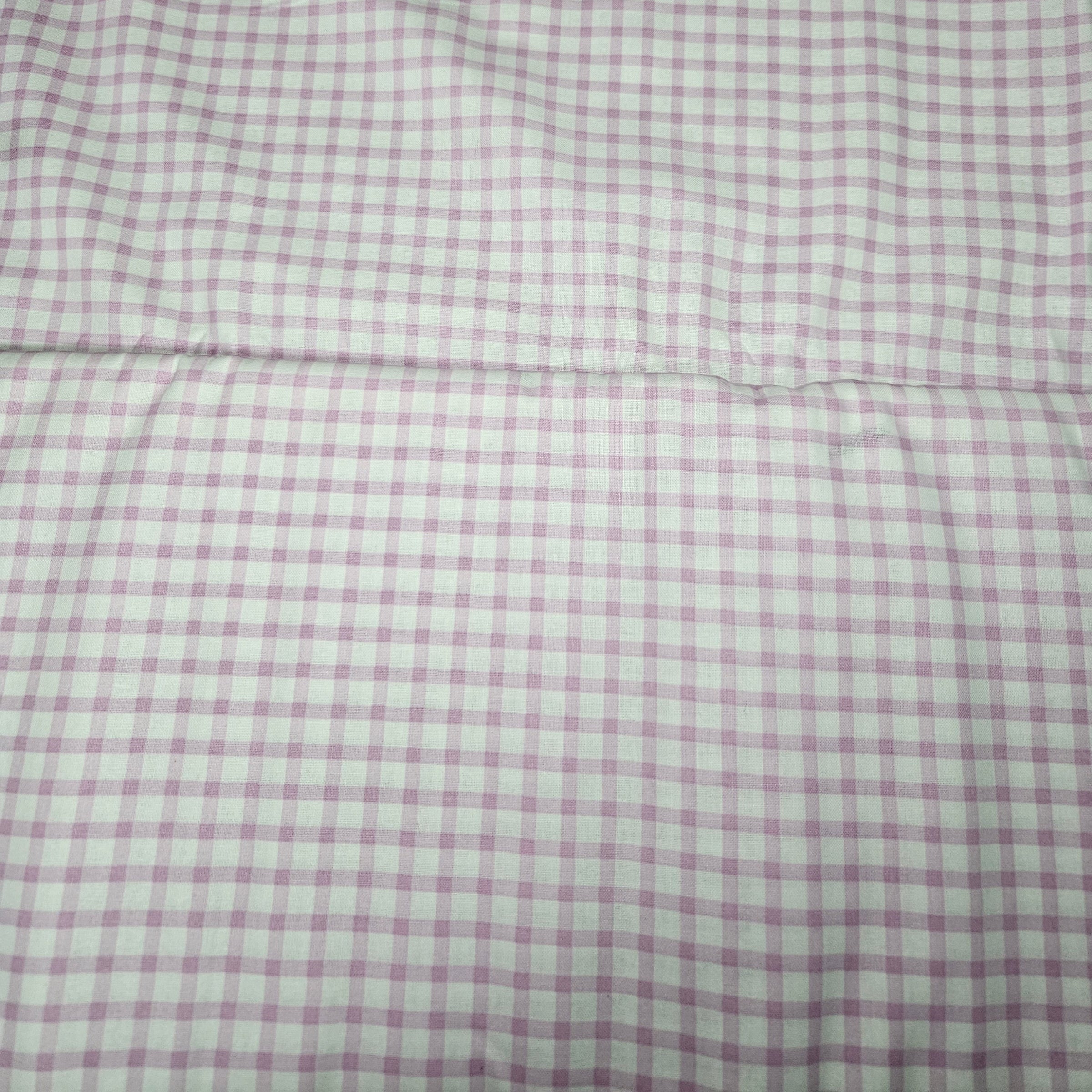 Close-up of a pink and white checkered fabric