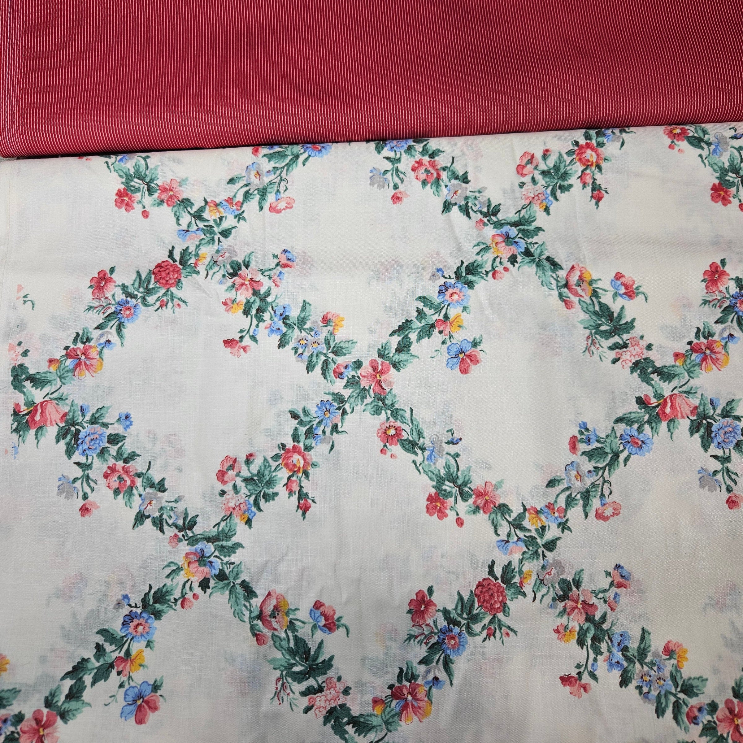 Floral patterned fabric with a plain red fabric