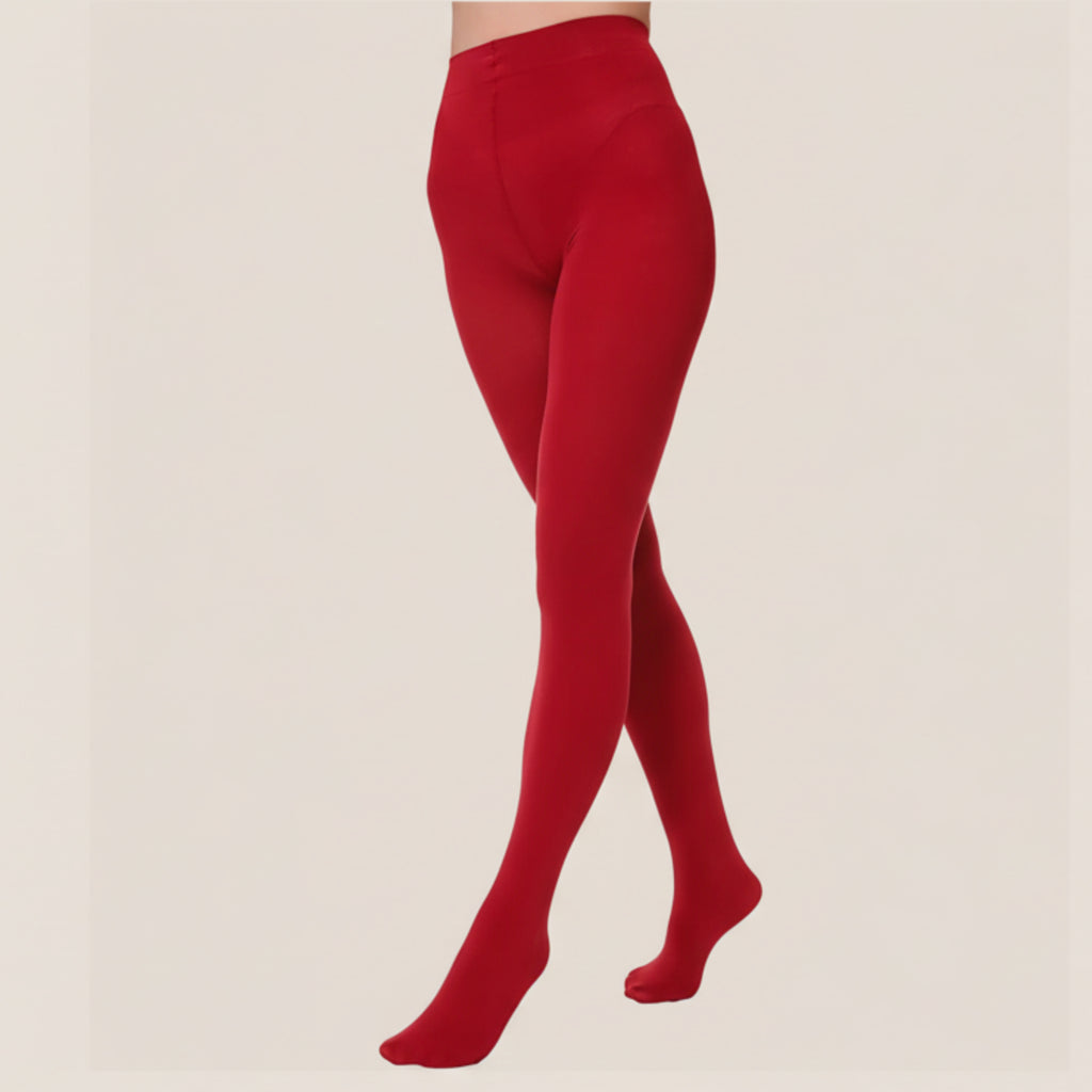 Red tights worn by a person on a white background