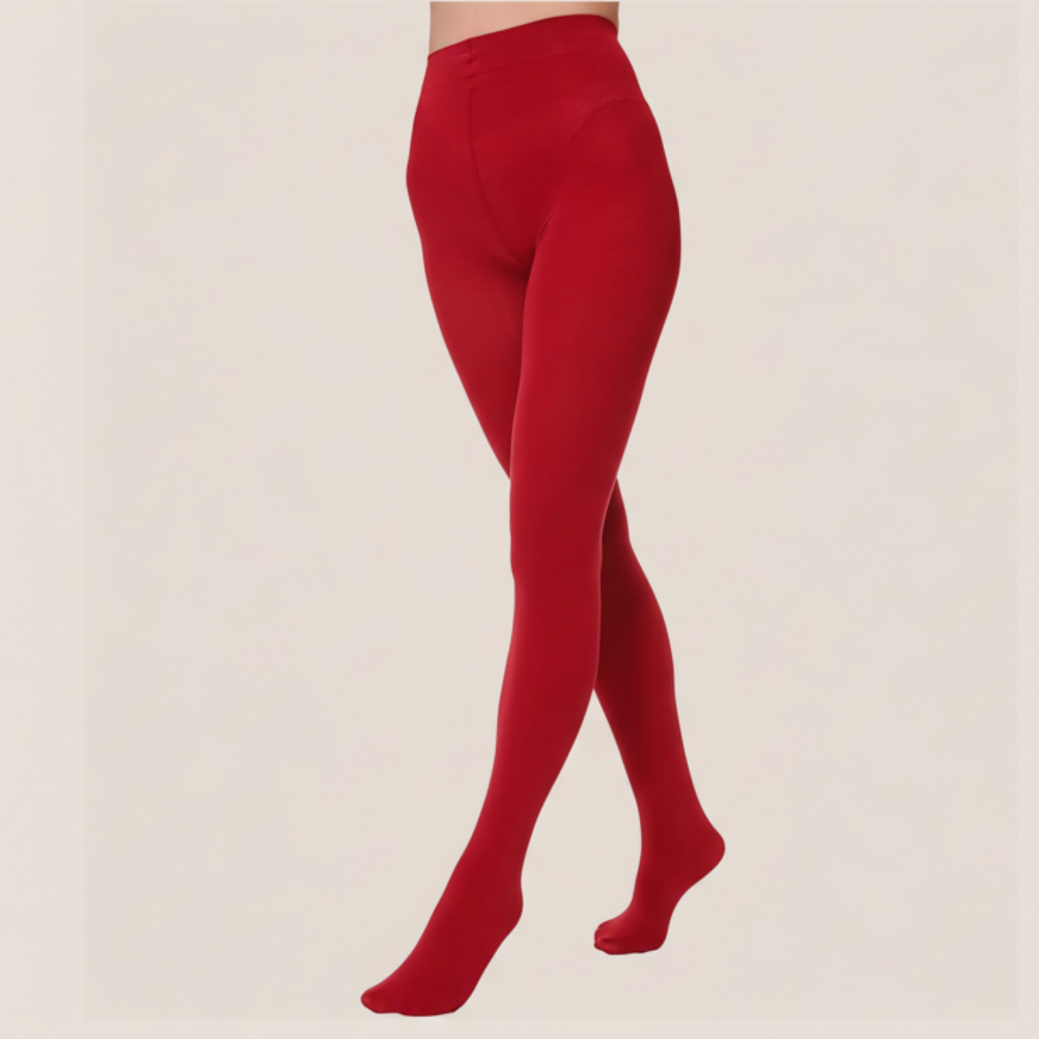 Red tights worn by a person on a white background