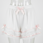 White Satin Sleep Shorts with pink ribbons on a white background