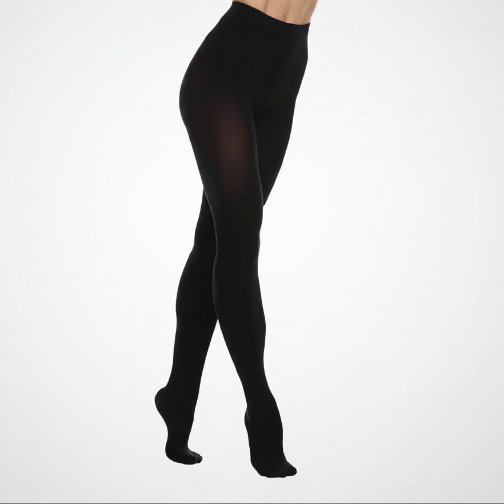 Black tights worn by a person on a white background