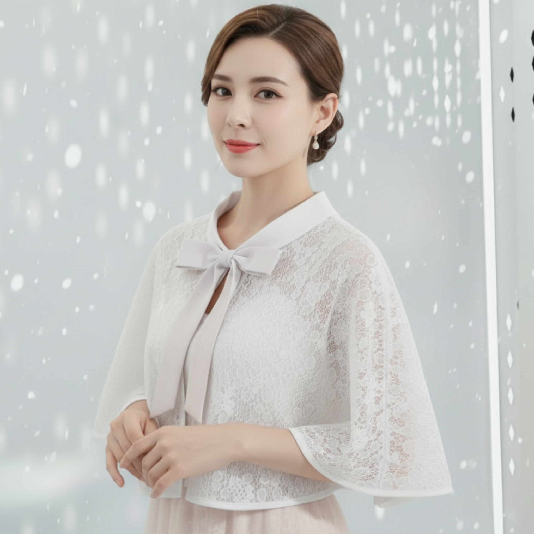 Lace cape with a bow tie on a light gray background