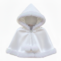 White hooded cloak with fur trim on a white background