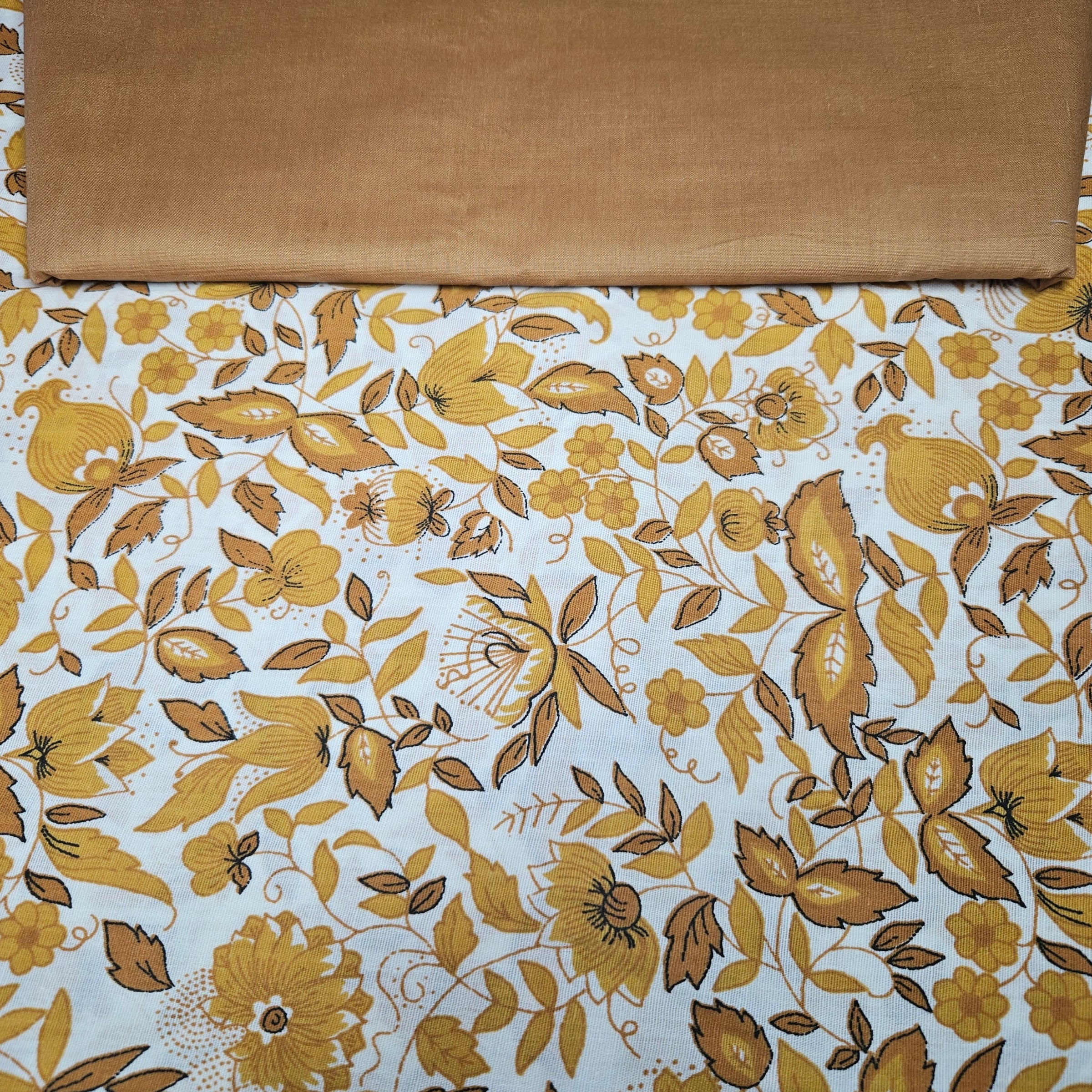 Brown floral fabric pattern on a white background