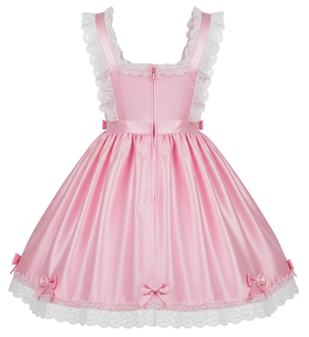 Pink dress with white lace details on a white background