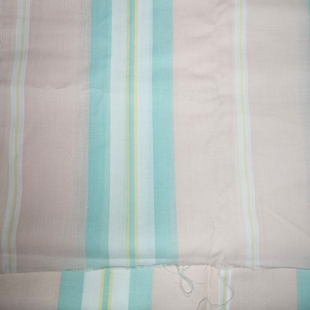 Striped fabric with pastel colors on a Peach background