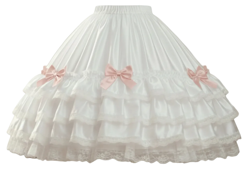 White satin skirt with ruffles and pink bows on a white backround
