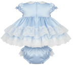 Light blue baby dress with ruffled layers and matching bloomers on a white background