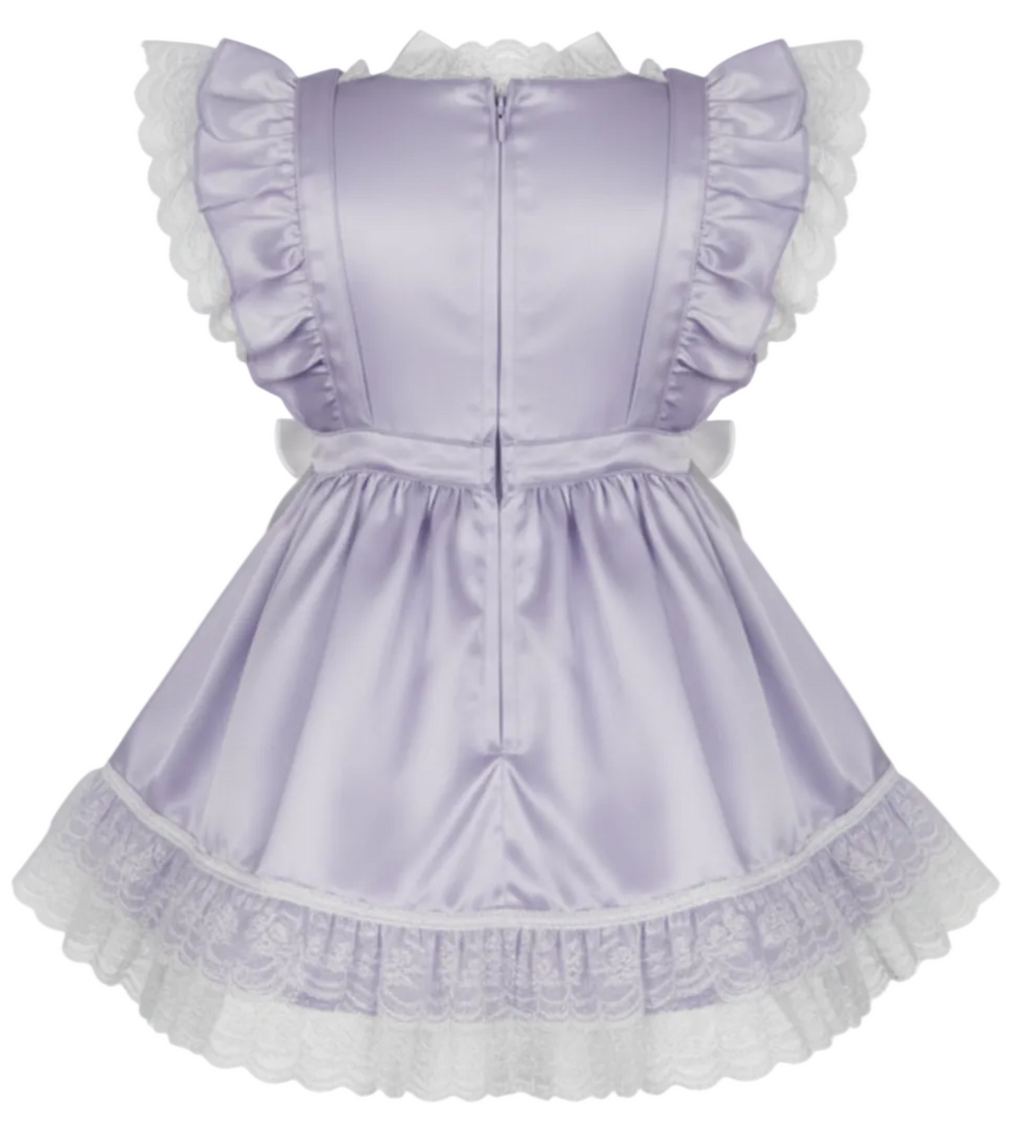 Lavender dress with white lace trim and bow on a white background