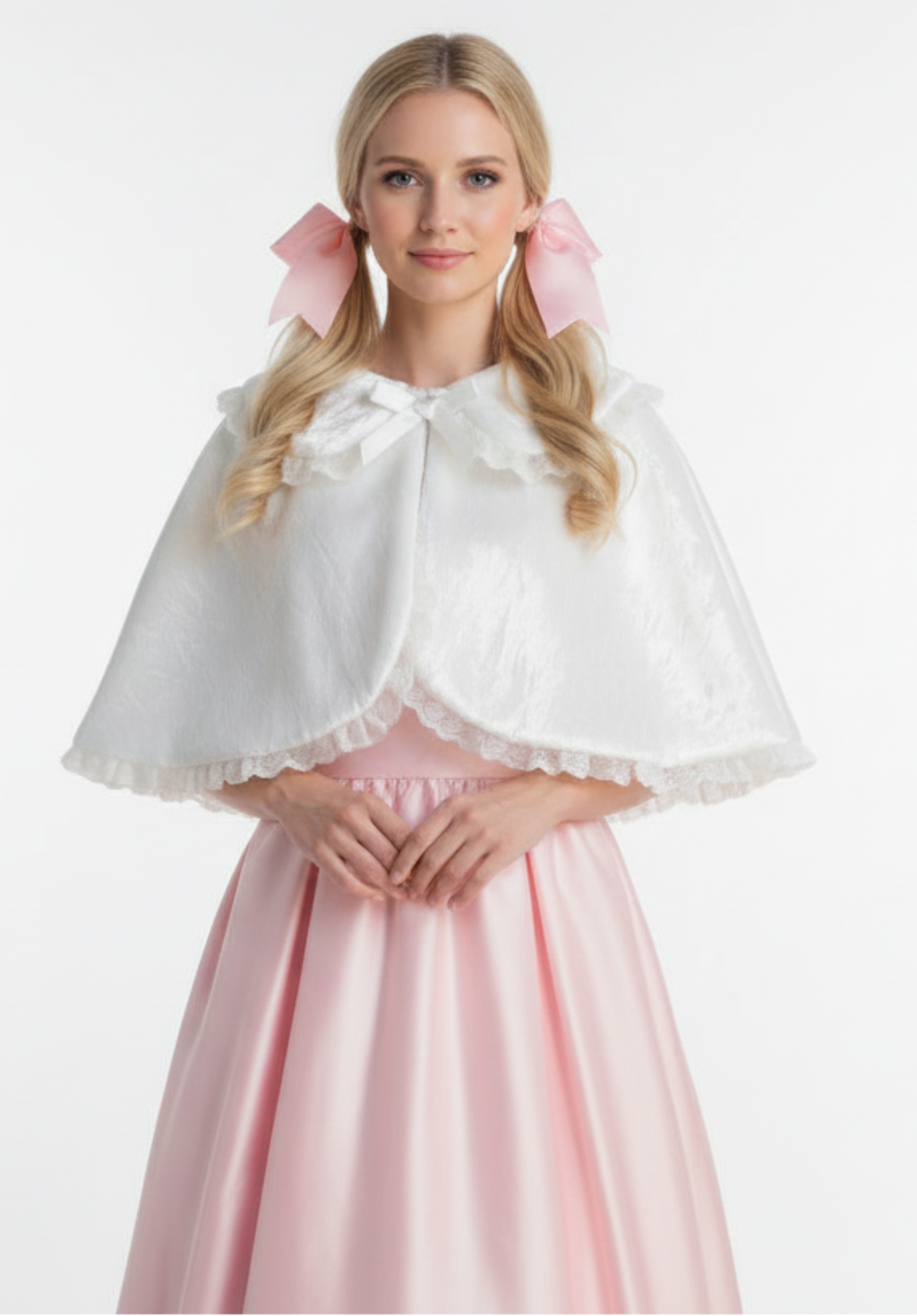 White velvet and satin cape with a bow on a white background